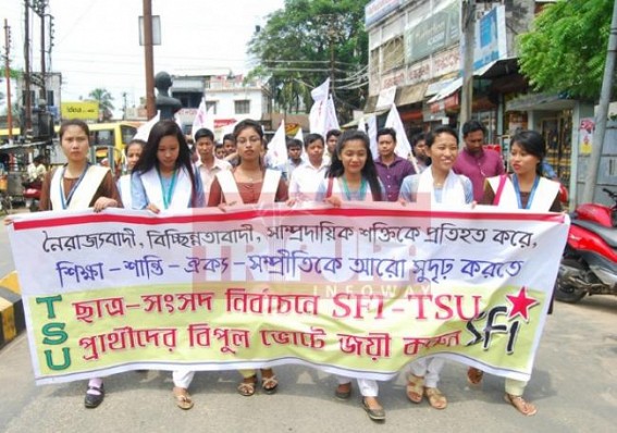 Students walking on roads in class hours with CPI-Mâ€™s slogan
